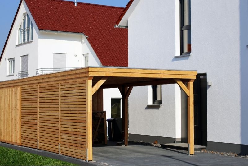 carport pergolas in a big white house